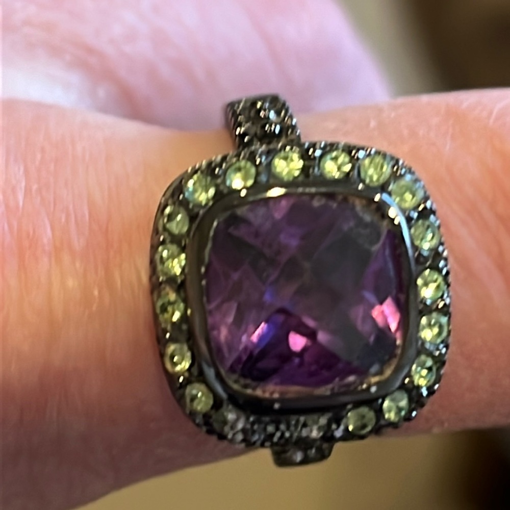 Unique purple/green stone ring.